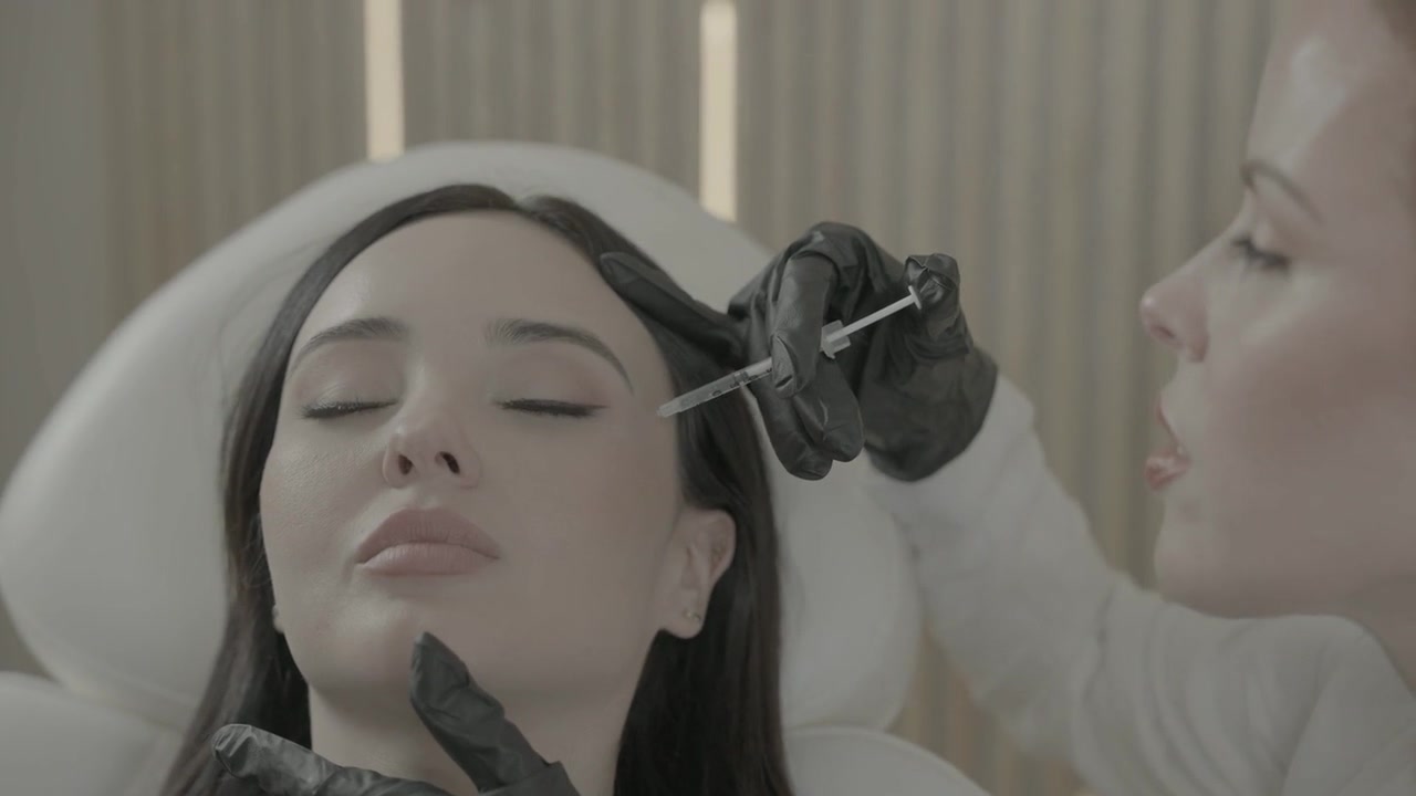 Dr. Laura Purdy in the Dan Elia films inside a medical aesthetics practice